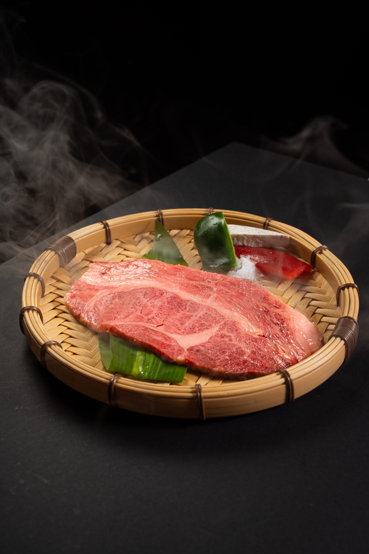 A raw ribeye steak ready for the grill