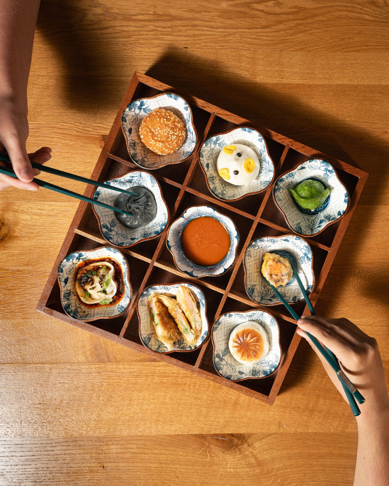 A nine-piece dim sum box at Lao Sze Chuan Baltimore