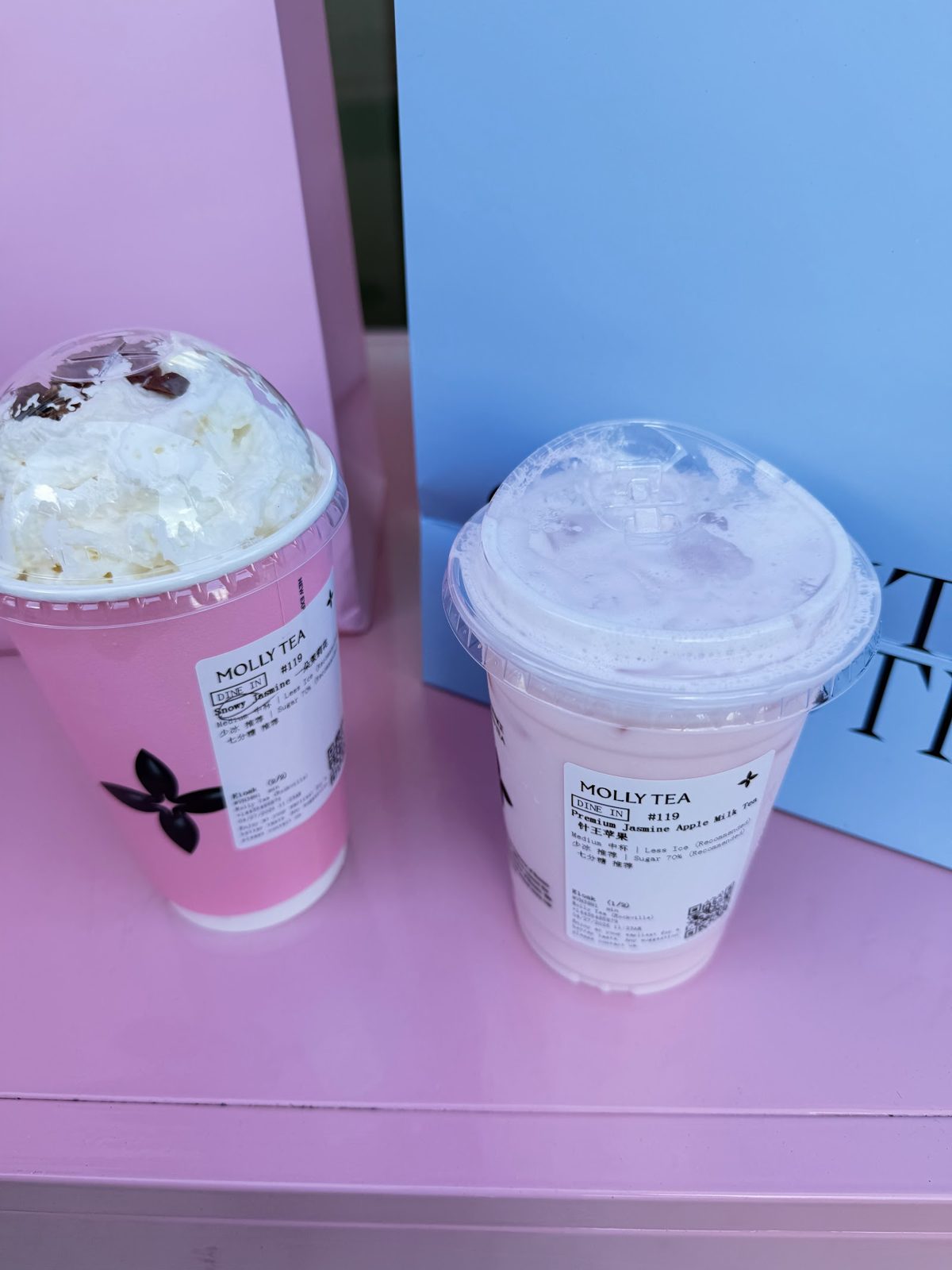 Two Molly Tea drinks with whipped cream tops at Molly Tea in Rockville, MD