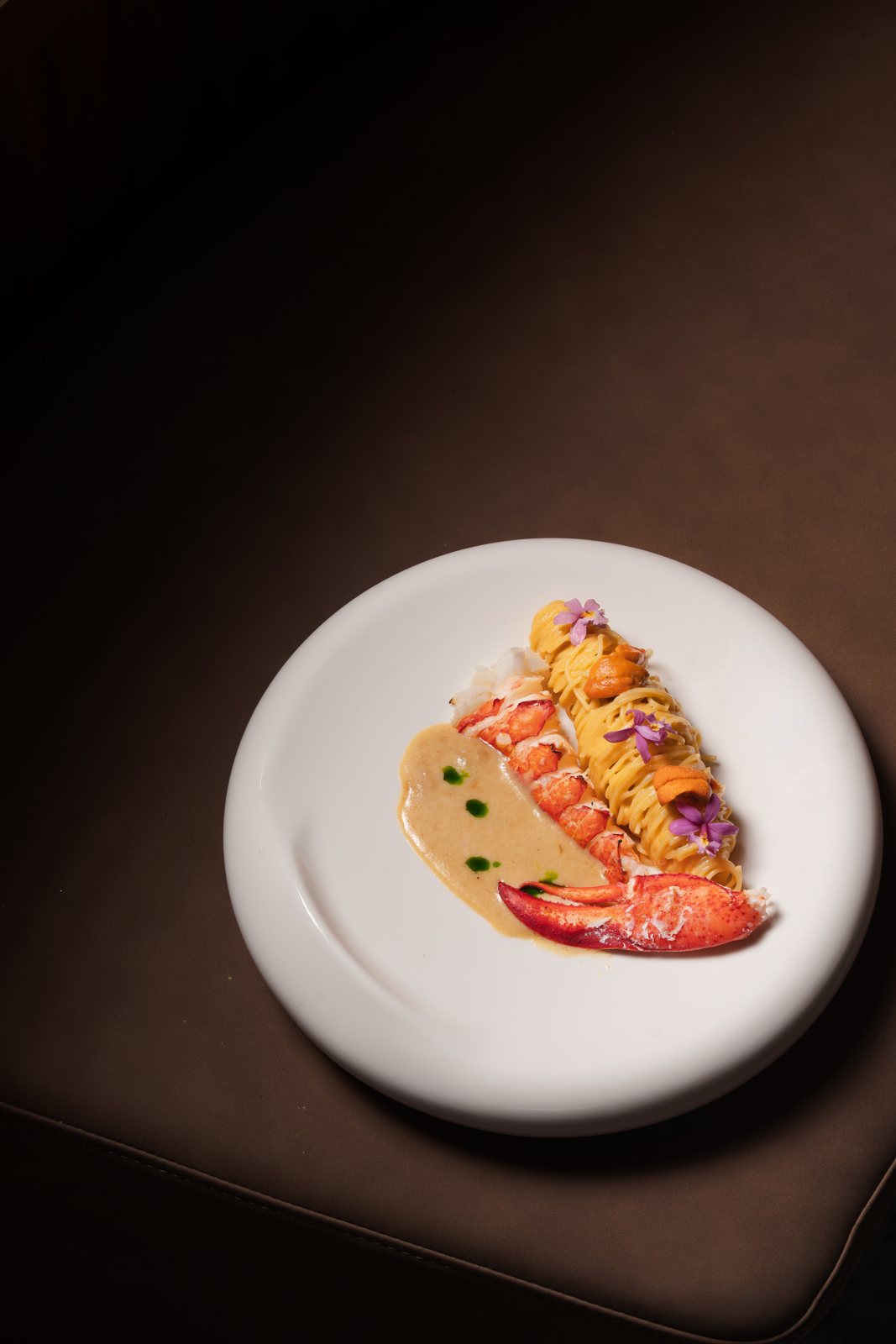 Lobster Uni Pasta with lobster tail and lobster dashi cream at MUI Supper Club
